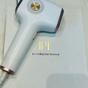 White and Gold IPL Hair Removal Device